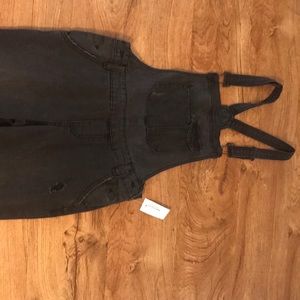 Overall ripped jeans